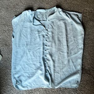 Blue blouse fits like an XL